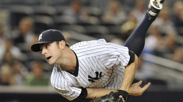 David Robertson pitches during the ninth inning. (June 28, 2012)