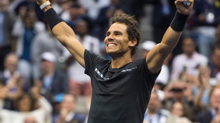 Rafael Nadal reacts after defeating Kevin Anderson in the U.S....