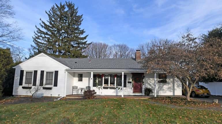 This three-bedroom, two-bath ranch in Huntington is listed for $499,000,...