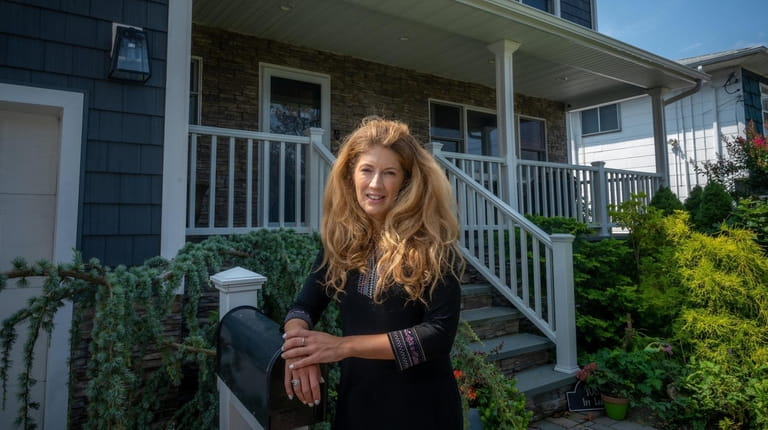 Allstate agent Christina Shaw, seen at her home in Lido...