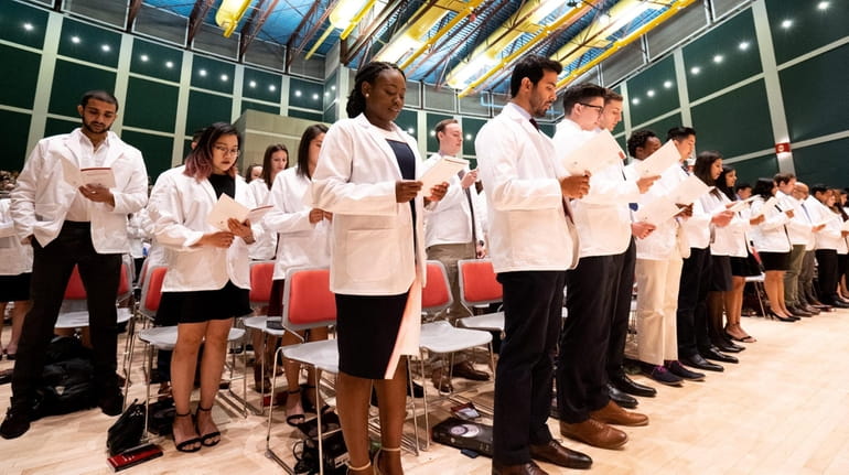 Incoming medical students on Sunday at Stony Brook University's white-coat...