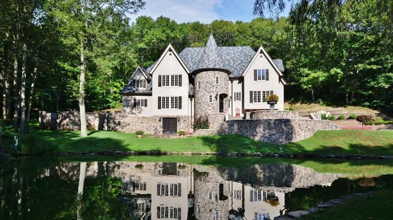 The five-bedroom, 3 ½-bath, 5,000-square-foot French Normandy-style home in Fort...