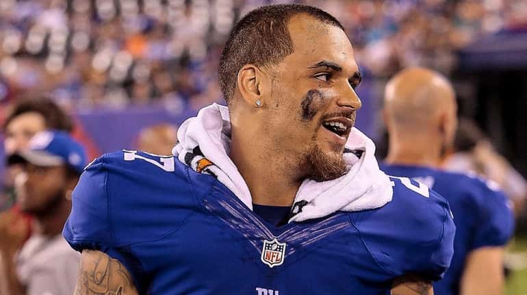 Darian Thompson of the Giants is seen on the sidelines...