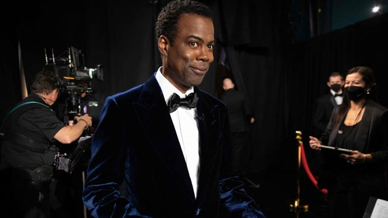 Chris Rock waits backstage during the 94th Oscars at the...