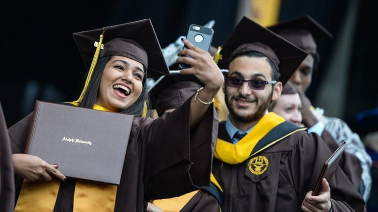 Saloni Jain, of East Meadow takes a photo on the...