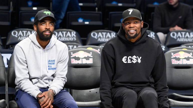 Nets guard Kyrie Irving (11) (left) and forward Kevin Durant...