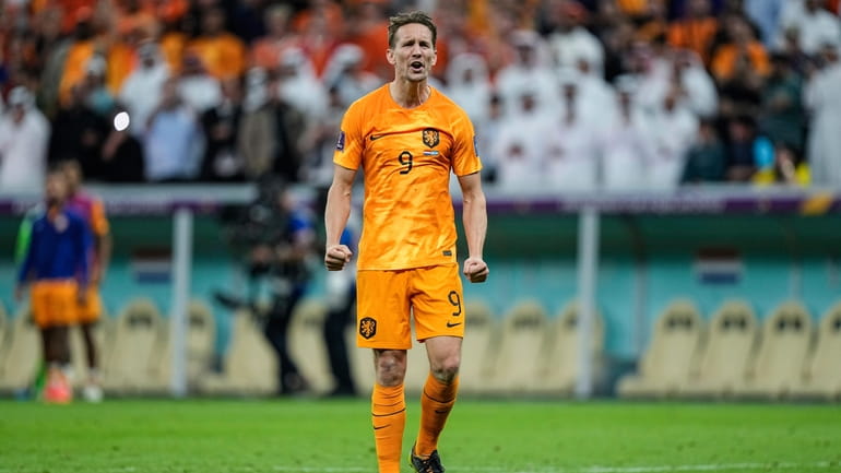 Luuk de Jong of the Netherlands celebrates after scoring a...