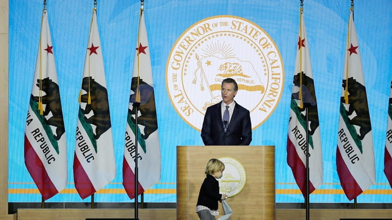 FILE - California Gov. Gavin Newsom speaks during his inauguration...