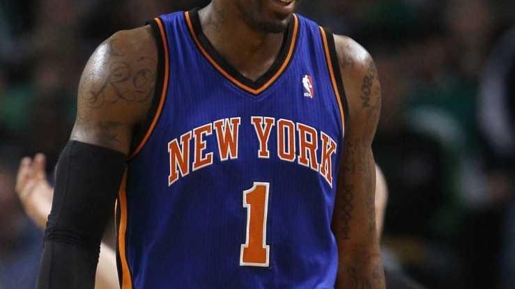 Amare Stoudemire #1 of the New York Knicks walks out...