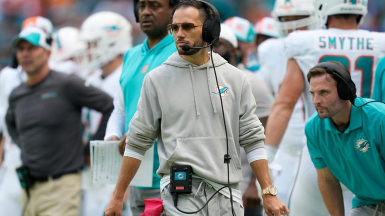 Miami Dolphins head coach Mike McDaniel walks the sidelines during...