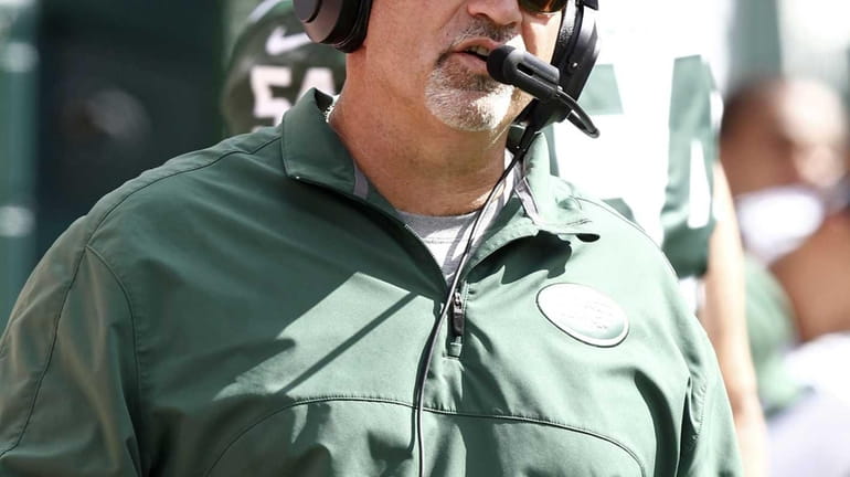 Tony Sparano coaches during the Jets' season opener against the...