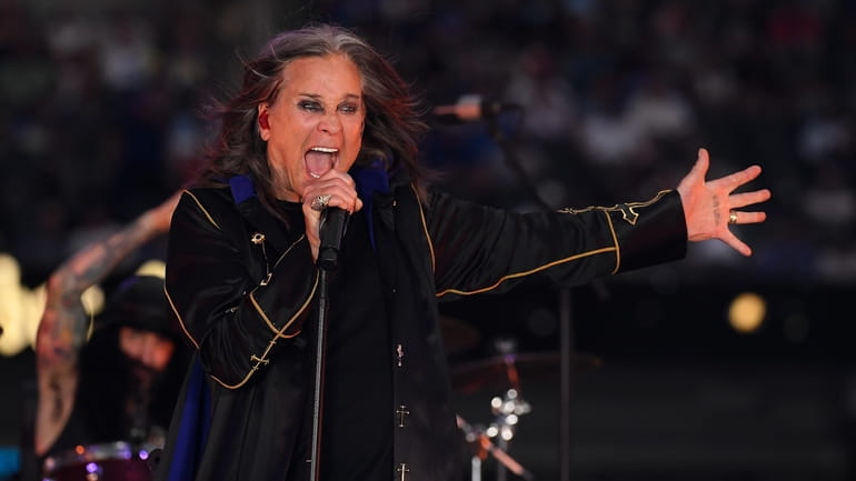Ozzy Osbourne performs during halftime of the NFL game between...