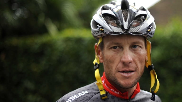 Lance Armstrong arriving to take part in a training session...
