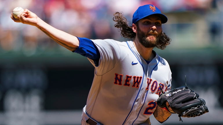 Mets pitcher Trevor Williams throws during the first inning in...