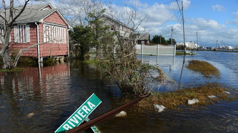 Flooding, debris and damage from the storm surge during superstorm...