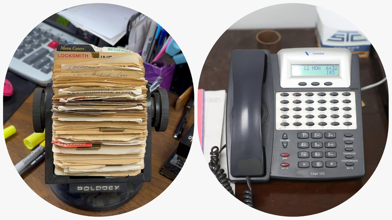 A Rolodex, left, and Comdial phones installed around 2003 are among...