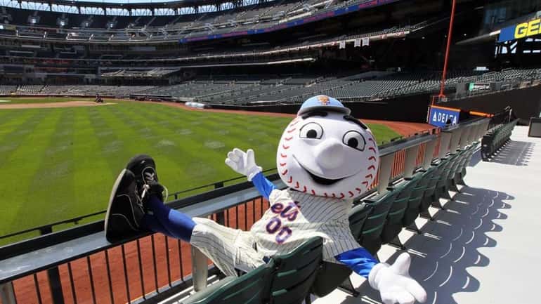 Mr. Met poses for a photograph in the new left...