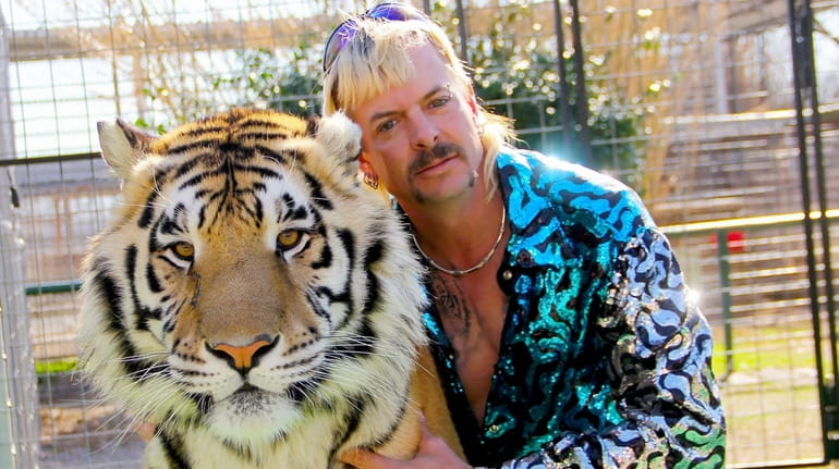 Joseph "Joe Exotic" Maldonado-Passage appears with one of his tigers...