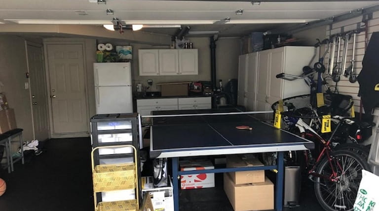 Rob Remhild. of Plainview, uses his garage as a space...