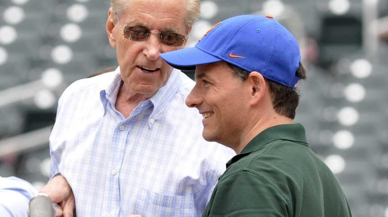 Mets co-owner Fred Wilpon and prospective partner David Einhorn chat...