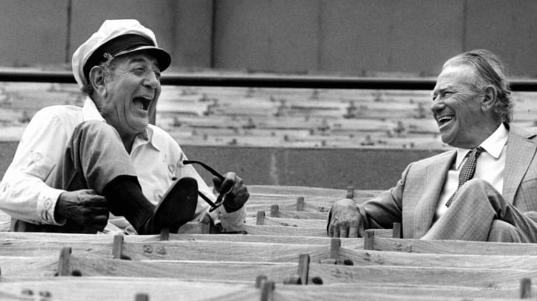 Guy Lombardo and E.Y. "Yip" Harburg share a laugh during...