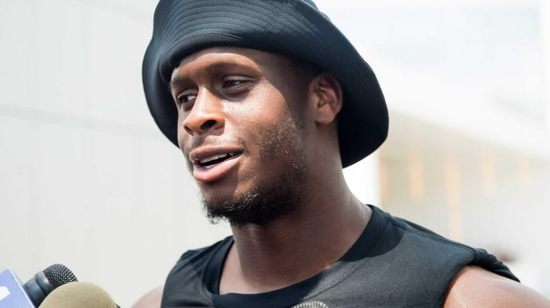 Jets quarterback Geno Smith reports for training camp at the...