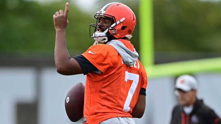 Browns quarterback Jacoby Brissett looks to throw during a practice in...