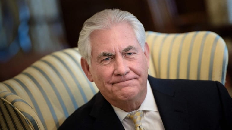 Secretary of State Rex Tillerson waits for a meeting with...