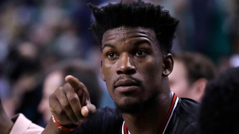 Bulls forward Jimmy Butler on the bench during the second...