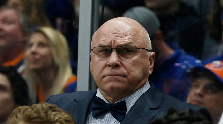 Head coach Barry Trotz of the New York Islanders wears...