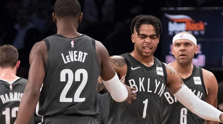 Brooklyn Nets guard D'Angelo Russell and guard Caris LeVert against...