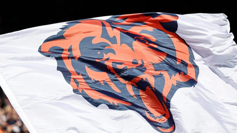 The Chicago Bears logo is pictured on a flag prior...