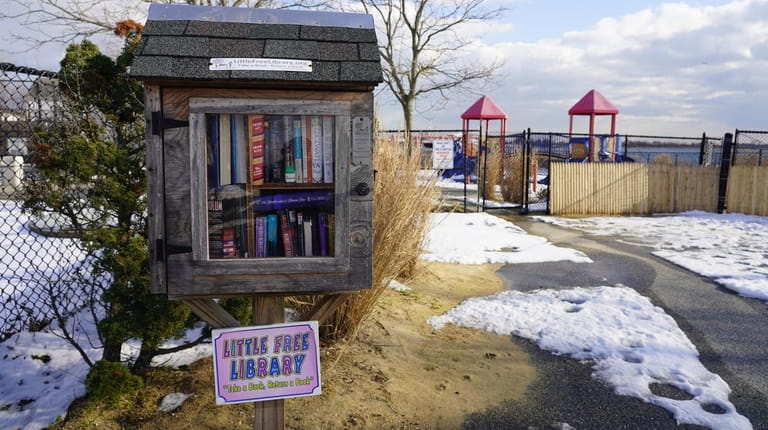 Little Free Library and playground at Hewlett Point Park in...