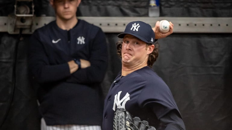 New York Yankees' ace pitcher Gerrit Cole throwing in the...