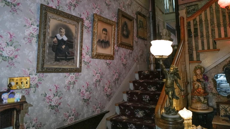 The Rosses have adorned their home with classical paintings and antiques they...