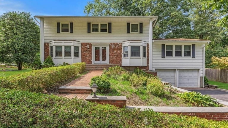 This $949,000 Commack home has four bedrooms.