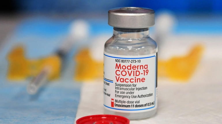 The Moderna Covid-19 vaccine awaits administration at a vaccination clinic...