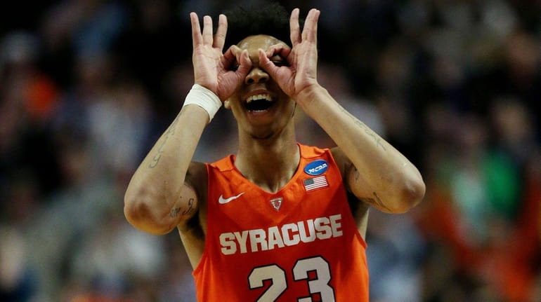 Malachi Richardson of the Syracuse Orange celebrates in the second...