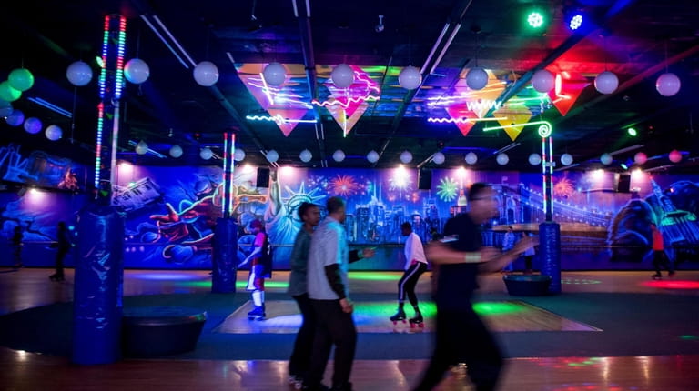 Roller skaters at United Skates, which hosts birthday parties, events and...
