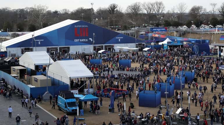 Fans gather outside the stadium prior to Super Bowl LIII...