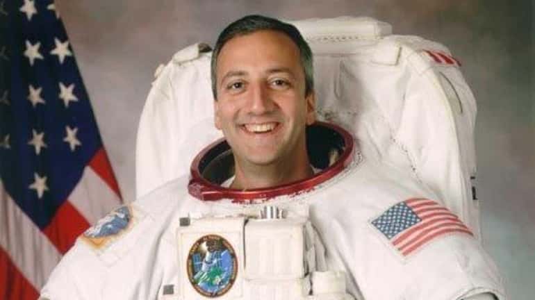 Long Island-raised astronaut Mike Massimino flew on two missions to work...