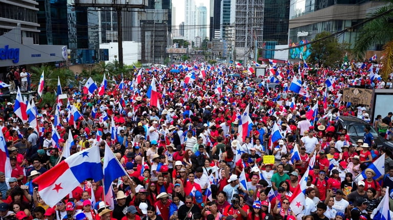 Panamanians celebrate after the Supreme Court declared a 20-year contract...