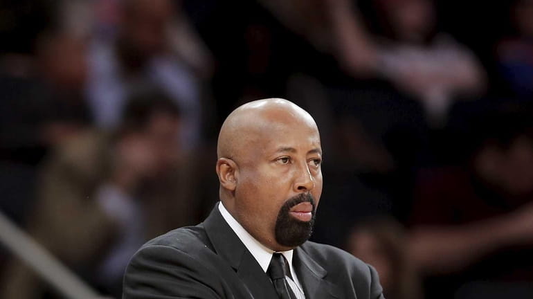 Knicks head coach Mike Woodson watches as the Knicks play...