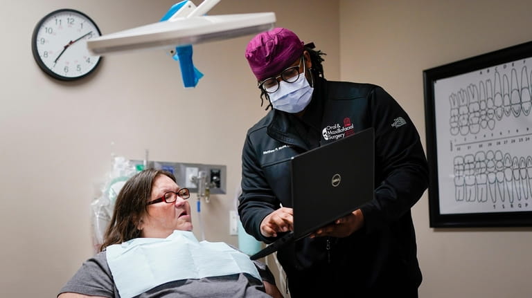 Cindy Clemons, left, discusses her treatment plan with Meharry Medical...