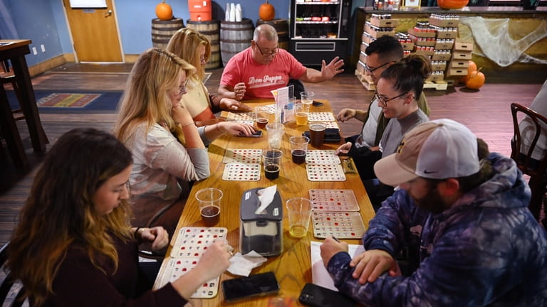 Visitors play Bingo during the Great South Bay Brewery's Bingo...