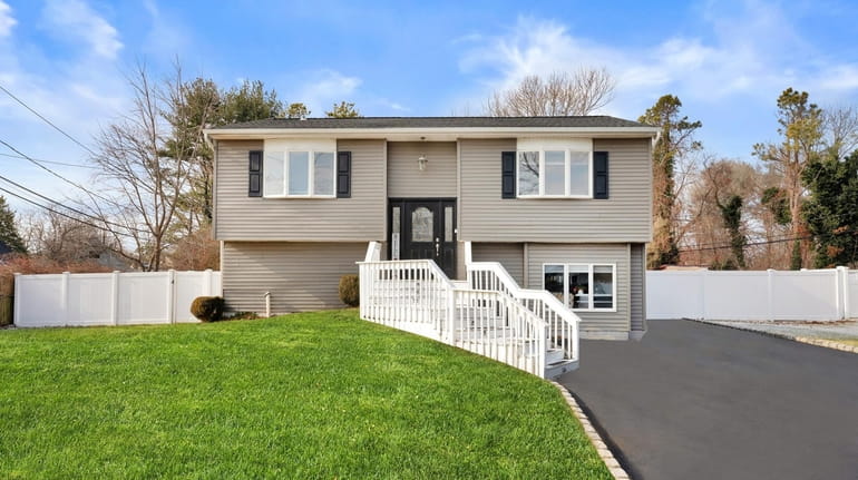 This home in Holtsville, which was listed for $539,000, went...