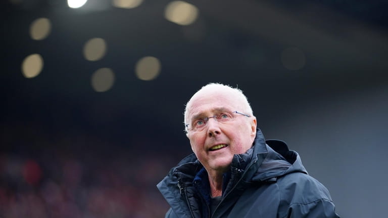 Former England manager Sven-Goran Eriksson looks up before the start...
