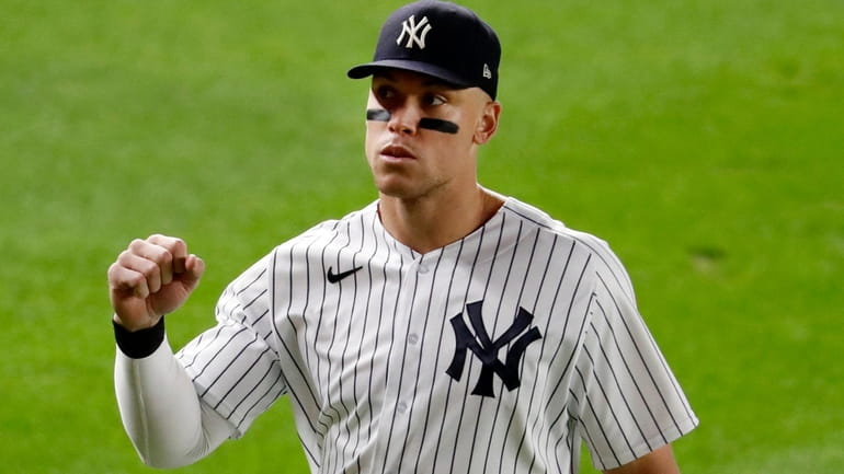 Aaron Judge of the Yankees acknowledges 'Roll Call' in the first...