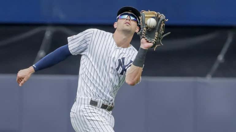 FILE PHOTO: New York Yankees shortstop Tyler Wade #14 catches...