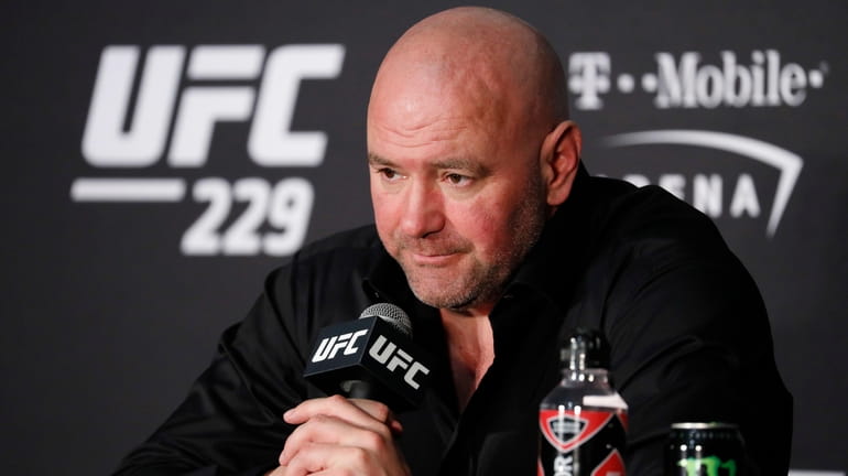 UFC president Dana White speaks at a news conference after...